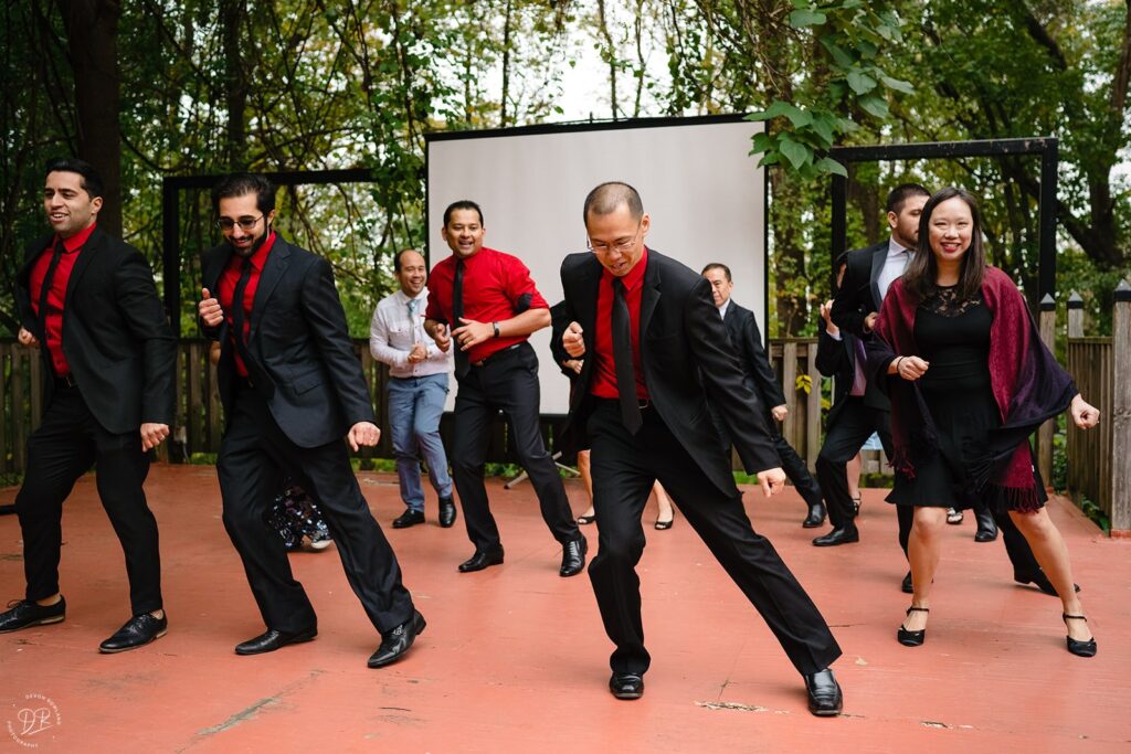 Wedding guests dancing in an amphitheater 