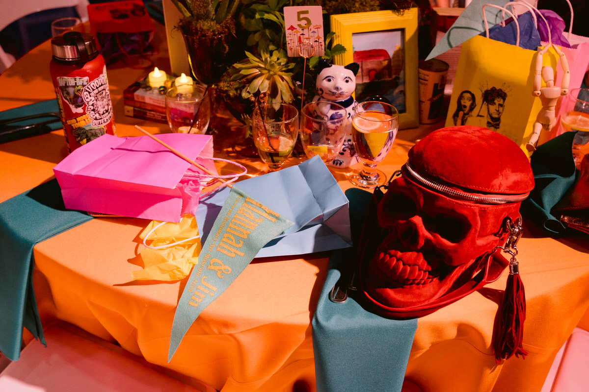 Various colorful trinkets on a reception table at an American Visionary Art Museum wedding