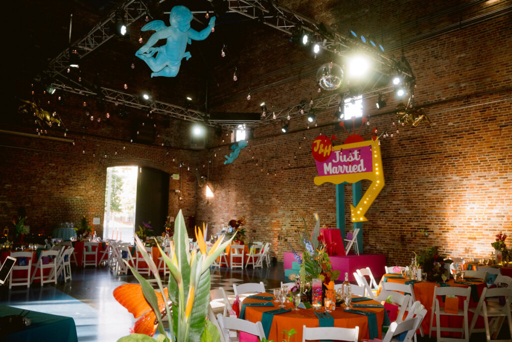 A colorfully decorated wedding reception hall. 